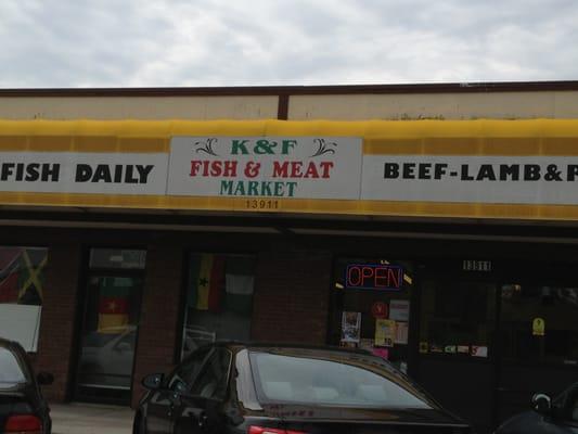 K&F Fish & Meat Market against the backdrop of a cloudy June 2013 sky