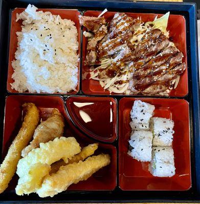 Beef Teriyaki Bento - Beef, house teriyaki sauce, shrimp & veggie tempura, ginger salad, miso soup, steamed rice, California roll.