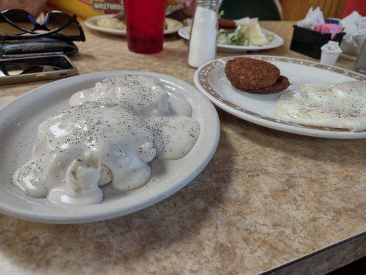 Half order of Biscuits & Gravy, 2 Over Easy Eggs, and an order of Sausage Patties