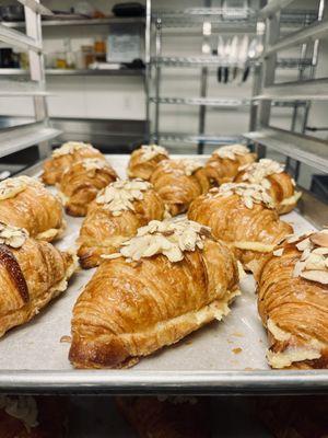 Almond croissants ready to go in the oven.