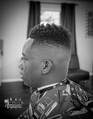 Bald fade with twist look on top