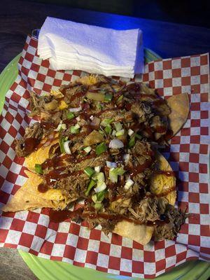 A low-lit photo but these Luau Pork Nachos were SO GOOD. 10/10 would eat again for sure.