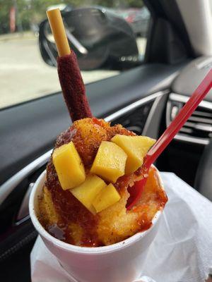 Mango snow with extra for mango, straw and chamoy