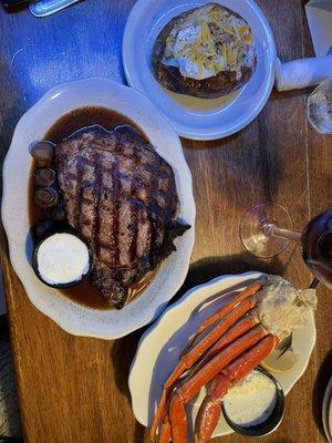 Charbroiled Prime Rib, 1/2 Lb. Snow Crab Legs, and a loaded baked potato