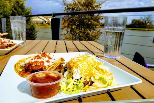 Tacos on their gorgeous patio overlooking a pond!