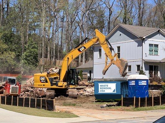 Bulldozer & dumpster.