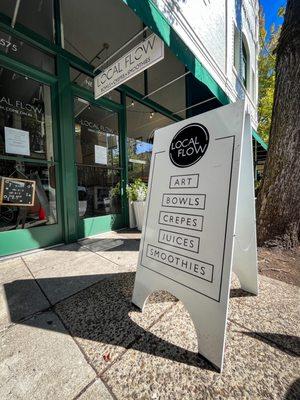 Local Flow Sandwich Board in Front of Shop