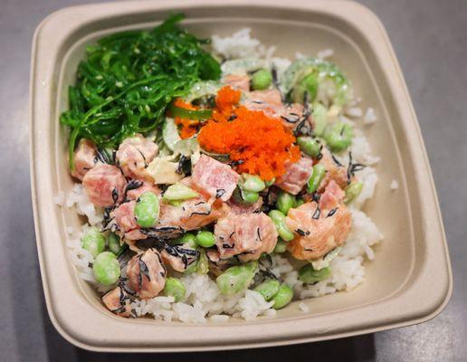 Poké bowl with seaweed, tobiko, Wakame, salmon, jalepeño and edamame.