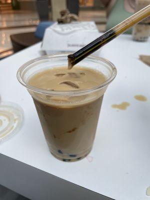 Pic of black milk tea with tapioca pearls clogging the straw lol.