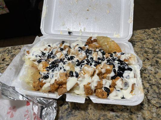 Chicken nachos w/black beans and sour cream!