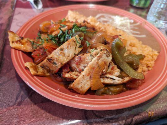 Chicken House Fajitas, with the side of rice and beans which I added.