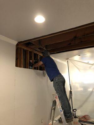 Water damage on main floor ceiling from upstairs bathroom