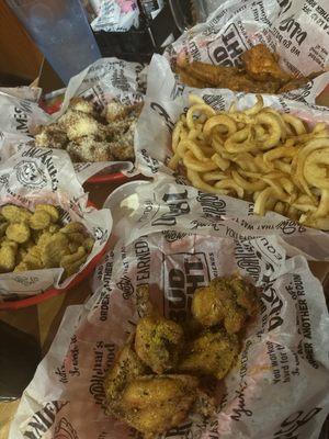 Fried pickles , lemon pepper wings,garlic Parmesan wings , fries