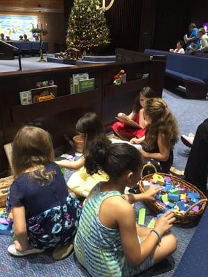 Children listening to service while being able to move around.