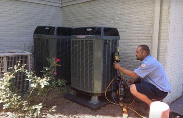 Our tech on site diagnosing AC system