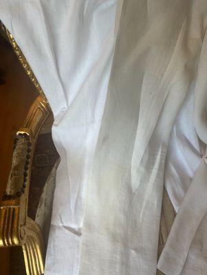 Side by Side Comparison of my other white pants, verus what they gave me yellow and destroyed. Unacceptable!