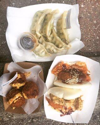 Veggie dumplings, cheesy rice balls, and crispy shrimp Bao, Korean chili chicken bao