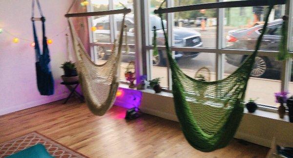 Bliss hammocks availible for lounging in pre or post class'