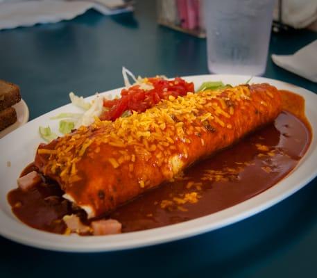 From a few years ago, breakfast burrito (ham) smothered with red chile sauce