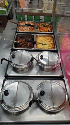 Full Service Hot Bar featuring hot soups and entrees prepared fresh for you daily.