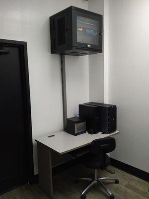 TechWorks installed this wall-mounted secure IT cabinet, server, and backup server in customer's I.T. room.  Clean and neatly organized!