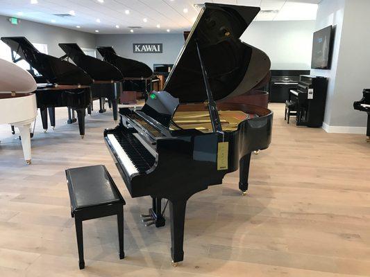 Certified Pre-Owned Yamaha pianos in "Like New" condition.