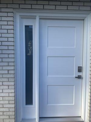 Shaker style fiberglass entry door with full view side light