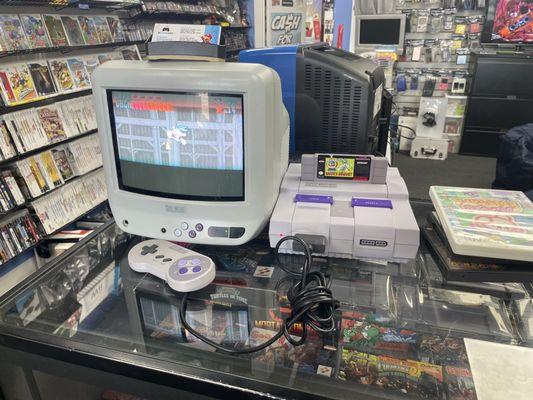 Snes and tv (to play while you're getting rung up at the register )