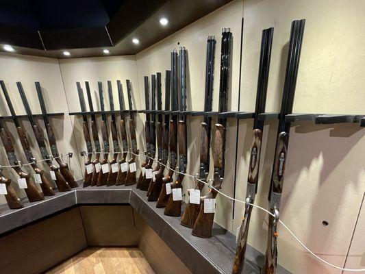 Beautiful high-end shotguns on display.