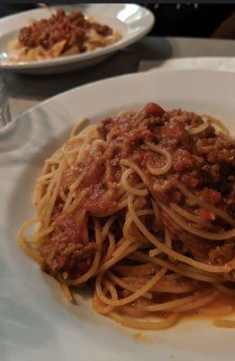 Spaghetti Bolognese and pappardelle with spicy sausage