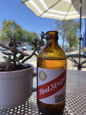 Red Stripe! Outdoor seating.