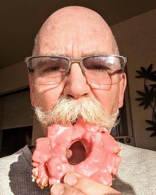 Lonny (aka @donutduster) with a strawberry old fashioned donut