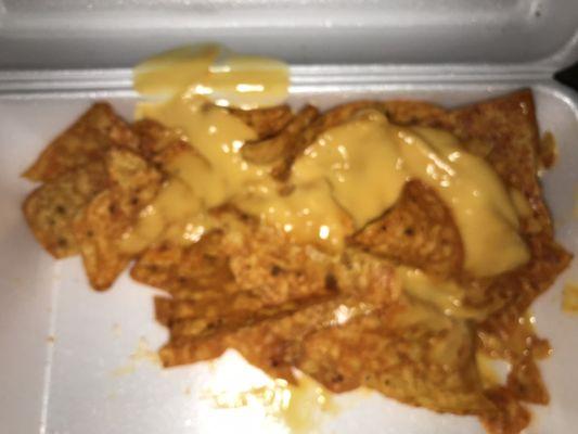 their "nachos" are just Doritos with cheese sauce