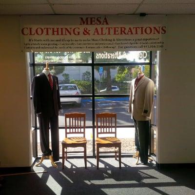 Front of Mesa Clothing and Alterations interior with mannequins and shop credo!