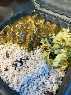 Curry goat, rice & beans, greens.