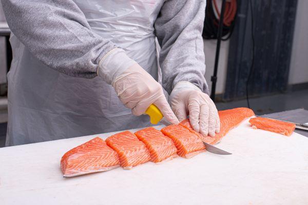 Delicious fresh salmon being prepared for shipment.