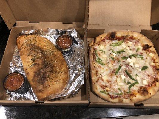 Left: Philly steak calzone. Nice amount of heat! Right: paneer cheese pizza