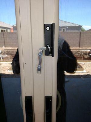 This is a New style latch on a Bi-parting door. Also known as a Butterfly door (because it opens and closes in the middle).