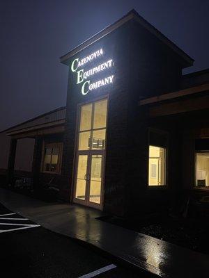 New Watertown store at night.