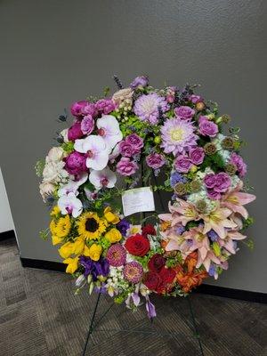 An incredibly gorgeous sympathy wreath. Gilbert is incredibly creative!