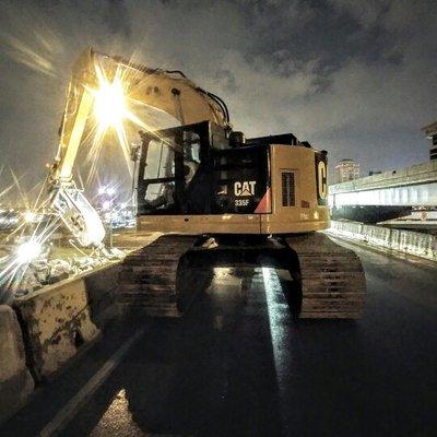 Premier Demolition's late night crew working on the Poplar Street Bridge over the Mississippi River in St. Louis, MO...