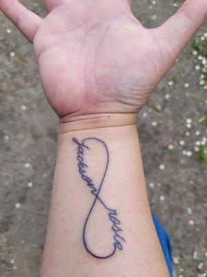 My very first tattoo (my children's name within an infinity symbol)