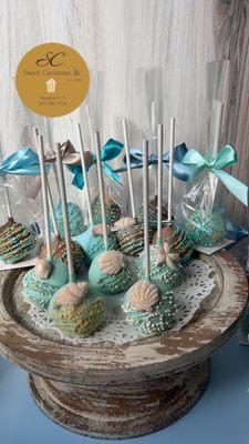 Beach themed cake pops by Sweet Creations, llc