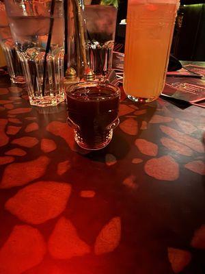 Devil shot in skull shut glass. Price $6.66. Genius!  Tasted like licking a shoe.  We were warned