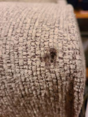 Our brand new  couch was delivered with burnt hole in it.