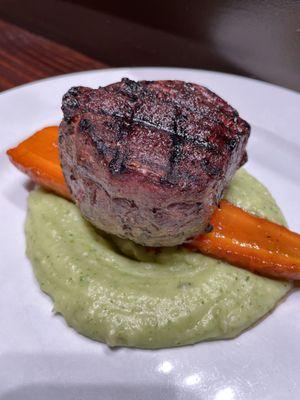 Grilled filet mignon over scallion mashed potatoes