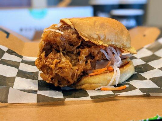 Bird on a Bun. Martin's potato bun, fried chicken thigh, pickled veggies, comeback sauce, with side (not pictured). $12.