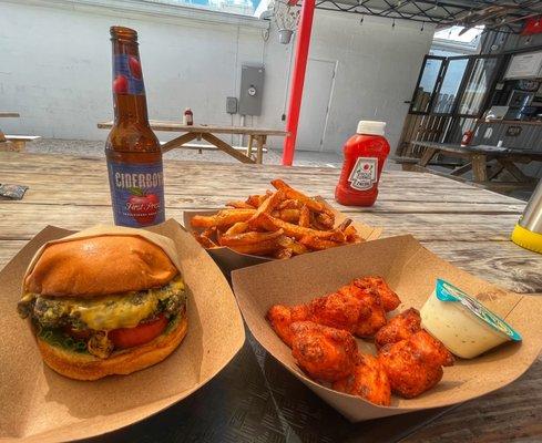 Veggie burger, cider, fries and cauliflower bites with ranch dressing