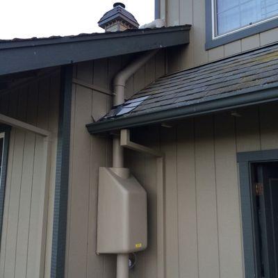 Radon fan on single family home in Concord