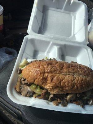 Call this is the corner steak sandwich oh my goodness it's huge  I am very inexpensive also